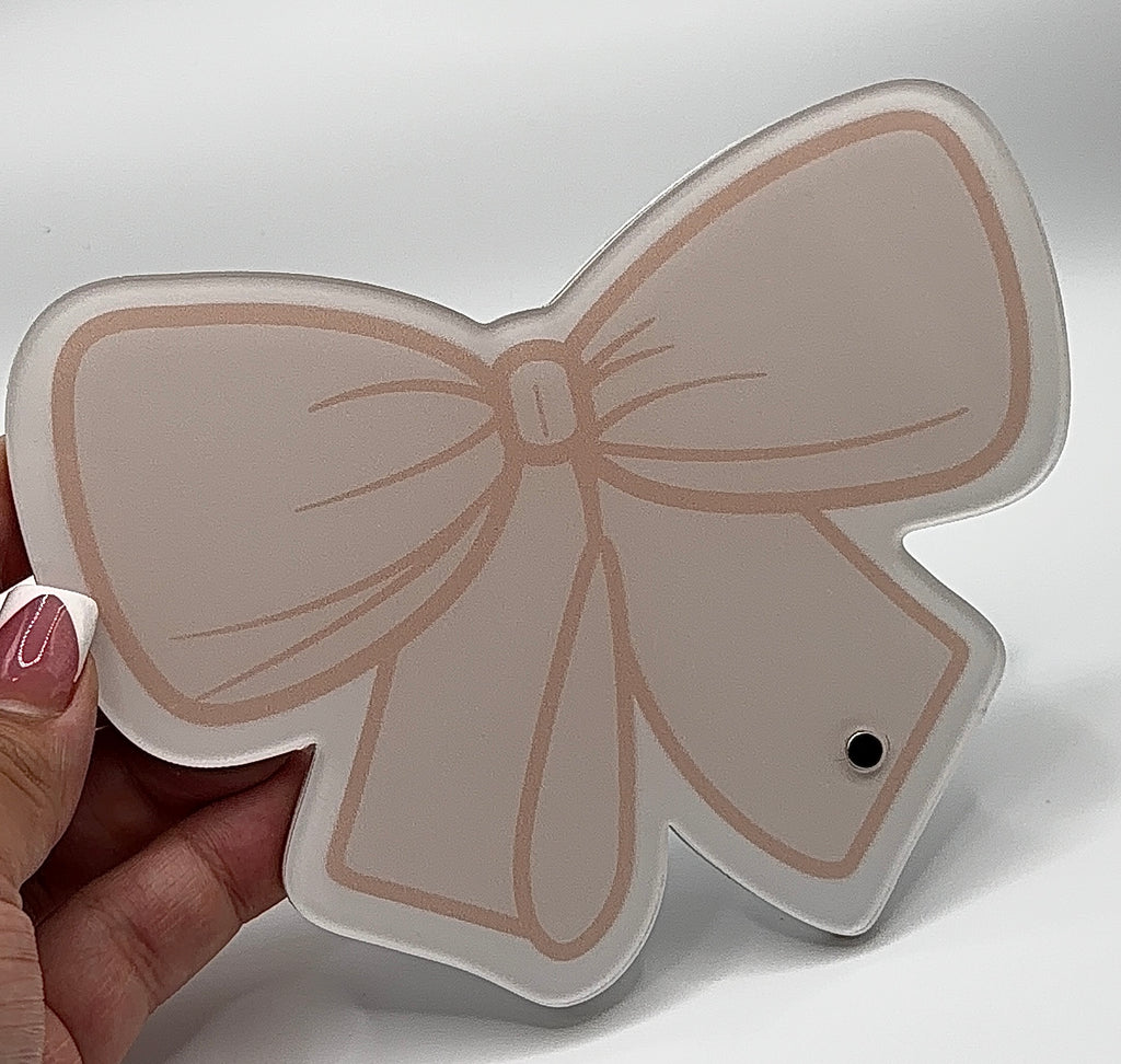 Tan Bow Lash Tile